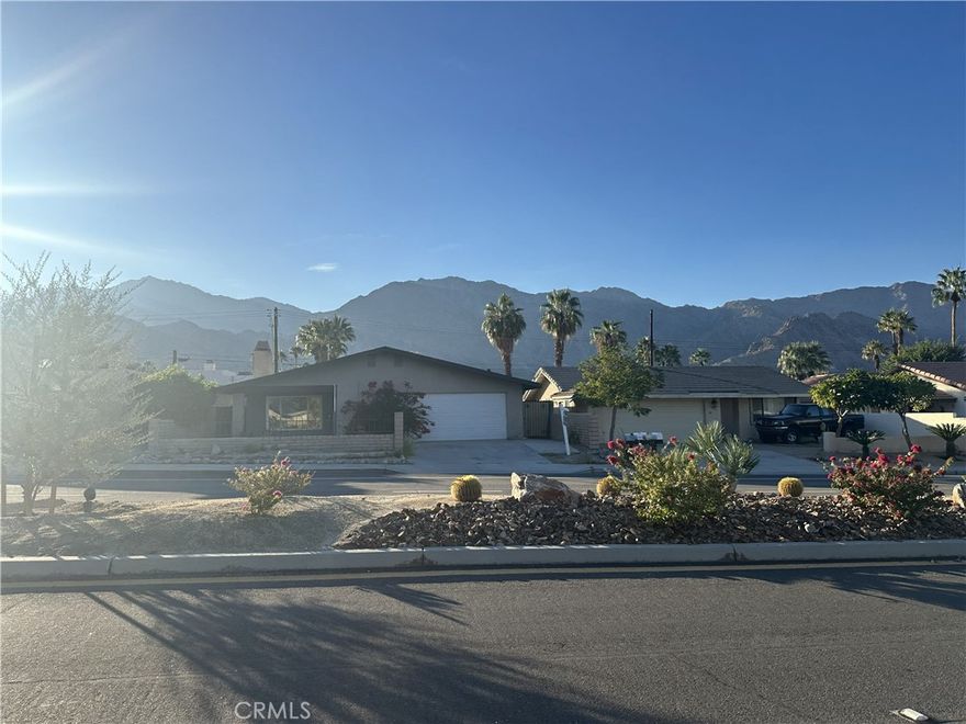 Perfect "La Quinta Cove" Single Family Residence with an ADU!! close to stores and schools. Main House features 3 Large Bedrooms, 2 bathroom.. laminate hardwood flooring through out the living room and bedrooms. Tile in the kitchen floors and bathrooms, Granite counter tops and backslash in kitchen and bathrooms. Wood Fireplace in the living room for those cold freezing days and AC central unit for those Hot days. ADU features 2 bedrooms and 1.5 bath, hardwood floors through out and tile in the kitchen area. ADU currently renting for $2000.00 per month. Don't miss out on this property, wont last!! Buyers to verify all permits and structure