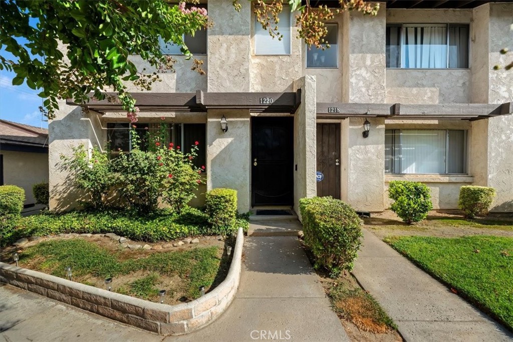 Great corner lot, features 3 bedroom, 2 and a half bathroom townhouse in Colton. close proximity to Loma Linda University, VA hospital, perfect for medical professionals or students. The main level with tile flooring and carpet stairs leading to the upper level. The cozy living room features a gas fireplace, perfect for those chilly evenings. HOA amenities include a fenced community swimming pool and hot tub where you can relax and soak up the sun during the warmer months.