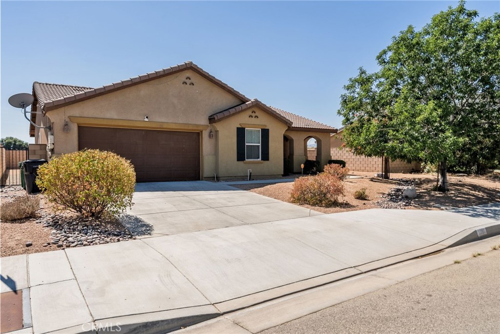 Beautiful Lancaster Home Built in 2009! This spacious 4-bedroom, 2-bath home offers comfort, style, and energy efficiency. Step inside to newer flooring and a bright, open layout connecting the updated kitchen, living room, and dining area—perfect for entertaining or everyday living. You will also find a fireplace in the living room perfect for those cozy nights. The master suite provides a private retreat with a walk in closet and private bathroom. The other 3 bedrooms are great sizes, perfect for a growing family. The 2nd bathroom has been tastefully upgrade with a beautiful countertop. Features a laundry room/pantry area.
PLUS!!!!!! Enjoy PAID-OFF solar panels, an EV charging station, and a low-maintenance backyard with artificial turf and a gorgeous covered patio. Beautiful Mountain views from the backyard. Located just steps from a park and soccer field, and close to schools, shopping, and commuter routes—this move-in ready home has it all.