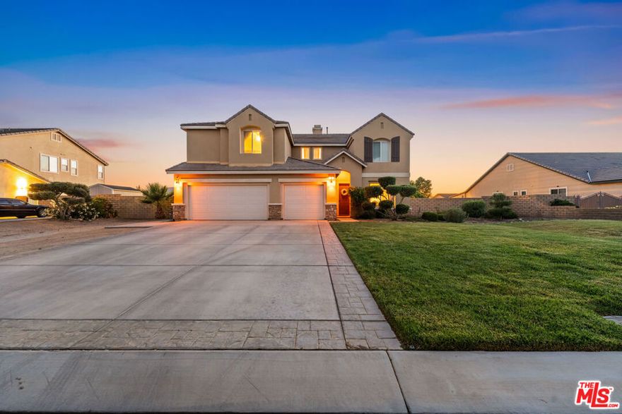 Welcome to 41507 Alexo Drive a luxurious West Lancaster estate that blends elegance, functionality, and opportunity. This home qualifies for an assumable FHA loan with an incredibly low 4.65% interest rate a rare chance to save significantly in today's market! Offering 5 bedrooms, 5 bathrooms, and nearly 4,000 square feet of beautifully designed living space, this two-story gem is perfect for families of all sizes. Featuring brand new carpet throughout, the home feels fresh, inviting, and move-in ready. Downstairs, you'll find a private suite, while upstairs includes 4 additional bedrooms, a bonus room, and a spacious loft ideal for a home office, gym, media room, or guest space. Step into the grand entry and enjoy soaring ceilings and natural light throughout. The formal dining room sets the tone for special occasions, while the open-concept kitchen is a true showstopper with a huge center island, double oven, and ample counter and cabinet space perfect for any home chef or entertainer. The downstairs laundry room with its own sink adds everyday convenience and thoughtful functionality right where you need it. The family room features a cozy fireplace, and the master suite upstairs offers a second fireplace, a walk-in closet, and his-and-her sinks for everyday comfort. Two upstairs bedrooms are connected by a Jack-and-Jill bathroom, while another upstairs bedroom offers its own private en suite bathroom. The bonus room and spacious loft provide flexible living areas to fit your needs. Step outside to your private retreat, an entertainer's paradise with a custom-built pool and spa, full-length covered patio, and a nearly half-acre lot completely enclosed by a brick wall for privacy and peace of mind. The 4-car tandem garage provides ample parking and storage. With paid solar, brand new carpet, a spacious layout, and a prime location in one of West Lancaster's most peaceful and sought-after neighborhoods just minutes from top-rated schools and commuter routes this home is a rare opportunity that checks every box. Welcome to paradise!