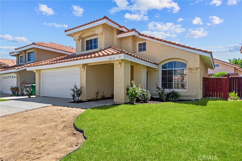 Highly sought-after Menifee Lakes master-planned community! This 4-bedroom, 3-bathroom home offers 1,732 square feet of comfortable living space and is perfectly tucked away in the charming Brigata on the Lake subdivision. From the moment you drive down the picturesque tree-lined streets, you’ll feel right at home in your very own slice of paradise. Step through the front door, and you’re greeted by cathedral ceilings, sun-filled windows, and a formal living/dining room that’s perfect for family dinners or hosting guests. The open-concept kitchen features a garden window overlooking the quaint backyard and patio, while the adjacent family room offers a cozy gas fireplace and easy access to the backyard through a sliding glass door—ideal for weekend barbecues or laid-back gatherings. Upstairs, the primary suite is a peaceful retreat complete with its own ensuite bathroom. Two additional bedrooms and a second full bathroom round out the upstairs, offering plenty of space for family, guests, or a home office. As a resident of Menifee Lakes, you’ll enjoy amazing amenities, including the Beach Club with a large lagoon-style pool, waterslide, and sandy beach, as well as a private gated lake with walking paths, gazebos, fishing, playgrounds, and the perfect backdrop for morning jogs or evening strolls. The location is just as impressive—walking distance to Mount San Jacinto College, Wheatfield Park, and the Menifee Library, with shopping, dining, and easy freeway access just minutes away. This is more than a house; it’s a lifestyle. Come see why life in Menifee Lakes is so special!