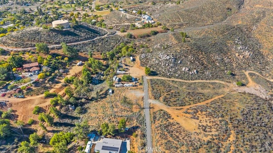 Awesome private land opportunity, located at end on the Cul-de-Sac and near freeway and highway.  Currently used for truck parking, materials, storage, etc.  Has easy water and electricity access. Most of it is useful flat land. Build your dream home or business. Consult with City Planning or Building and Safety for buildability and feasibility
Adjacent parcel also for sale