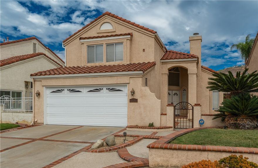 Enjoy this wonderful Villa Del Rio home with a great location and served by some of Yorba Linda’s best schools.   This spacious home enjoys a gated front courtyard and a private wrap around yard with spa.  This appealing floorplan offers vaulted living and dining room ceilings, a large kitchen, separate eating area (in addition to the dining room) which opens to the family room.   All three bedrooms are light and bright, also with vaulted ceilings.  The primary bedroom includes a remodeled en-suite bath, walk-in closet, dual sinks, a jetted tub with shower and large skylight.  Updating includes PEX repiping (2020), new water softener (2025), new fence (2025), and updated air conditioner & furnace, and an insulated Alumawood patio cover.   Enjoy nearby parks, hiking, and outdoor activities while being centrally located close to freeways with easy access to Orange, Riverside and LA Counties.