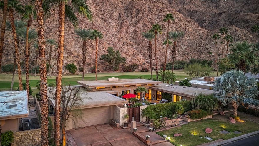 Panoramic mountain and golf course views meet timeless desert elegance in this beautifully updated mid-century contemporary home, perfectly positioned along the 5th hole of the iconic Indian Wells Country Club Classic Course, once home to the Bob Hope Desert Classic. Nestled within a quiet mountain cove inside this prestigious guard-gated community, the residence captures the essence of refined desert living.Inside, soaring ceilings and walls of glass flood the spacious great room with natural light, framing dramatic south-facing vistas of the Santa Rosa Mountains and pristine fairways. Designed for both entertaining and serenity, the home offers multiple outdoor spaces, including a front pool patio with mountain views and a private rear terrace overlooking the course, ideal for sunset gatherings or morning coffee.The gourmet kitchen combines modern luxury with warmth, featuring maple cabinetry, slab granite countertops, stainless-steel appliances, and a large peninsula for casual dining. The primary suite is a sanctuary of relaxation with direct patio access, a walk-in closet, a freestanding soaking tub, and an elegant walk-in shower. An additional guest suite ensures comfort and privacy for family and friends.Every detail reflects thoughtful quality from tile and carpet flooring to updated systems and meticulous maintenance by the owner.Beyond the home, Indian Wells Country Club offers an incomparable lifestyle, 36 holes of golf and a welcoming clubhouse. Residents also enjoy exclusive city benefits, including reduced golf rates at Indian Wells Resort, complimentary tickets to the BNP Paribas Open, and local discounts at world-class hotels, spas, and restaurants.Just minutes away, the boutiques and fine dining of El Paseo and countless hiking trails invite you to embrace the desert's vibrant rhythm.