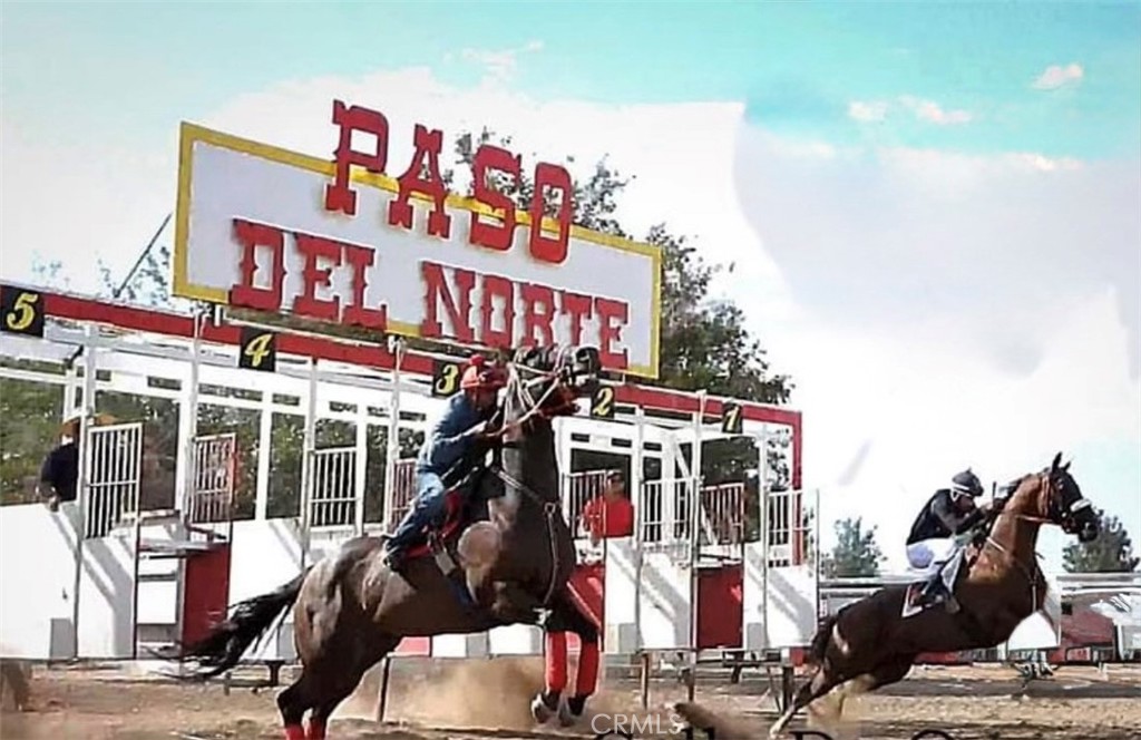 Welcome to Rancho Los Alamos, Internationally Known as Carril de Campeones, a Premier 30+Acre Equestrian and Event Facility and One of Only Three Properties in California with a Conditional Use Permit to Host Legal Horse Racing. This Fully Operational, High-Income Producing Business Draws Competitors, Spectators, and Media from Around the World, with Race Days Held Every Other Sunday.
Beyond Its Racing Pedigree, the Venue Generates Consistent Revenue from Monthly Horse Racing Events, Long-Term Horse Boarding, and a Variety of Private Rentals for Festivals, Quinceañeras, Large-Scale Cultural Events, and Film Productions. On Race and Event Days, Guests Enjoy a Selection of Food and Beverage Vendors, Enhancing Both the Visitor Experience and Profitability.
Purpose-Built for Professional Equine Use, the Property Features Over 35 Acres with a Private Well—Upgraded with a Brand-New Motor Installed in 2025—Approximately 100 Horse Stables, 8 Barns, Two Professional Race Tracks—One with Lanes and One Open Track—Grandstand Seating, Multiple Seating Areas, an Equine Hydrotherapy Swimming Pool, a Pond, and a Dedicated Event Stage.
The Ranch is Fully Equipped for Boarding, Training, and Competitive Racing Events, Including Tractors, Water Trucks, Solar Power, and Multiple Support Buildings. Expansive Parking and Event Staging Zones Ensure Smooth Operations for Gatherings of All Sizes.
Residential Accommodations Include Three On-Site Manufactured Homes:
A Spacious 3 Bedroom / 2 Bath (~2,576 Sq Ft, Built 1987)
A Second 3 Bedroom / 2 Bath (~1,456 Sq Ft, Built 1978)
A Third 1 Bedroom / 1 Bath (~672 Sq Ft, Built 1965)
These Homes Provide Convenient Living for Staff, Trainers, or Guests, Ensuring Full-Time Access to All Facilities and Seamless Daily Management.
This Offering Includes Both the Business and the Agricultural Land to Be Sold Together as a Continuing Legacy, Providing a Rare Opportunity to Acquire a Turnkey, Revenue-Generating Equestrian Enterprise with a Proven Track Record and the Infrastructure to Support Ongoing Growth.
With Its Rare Licensing, International Reputation, Proven Income Streams, and Turnkey Infrastructure, Rancho Los Alamos Offers Endless Opportunities to Expand Racing, Boarding, Events, and Specialty Equestrian Ventures. This is a One-of-a-Kind Investment in Southern California, Combining Prestige, Profitability, and World-Class Facilities.