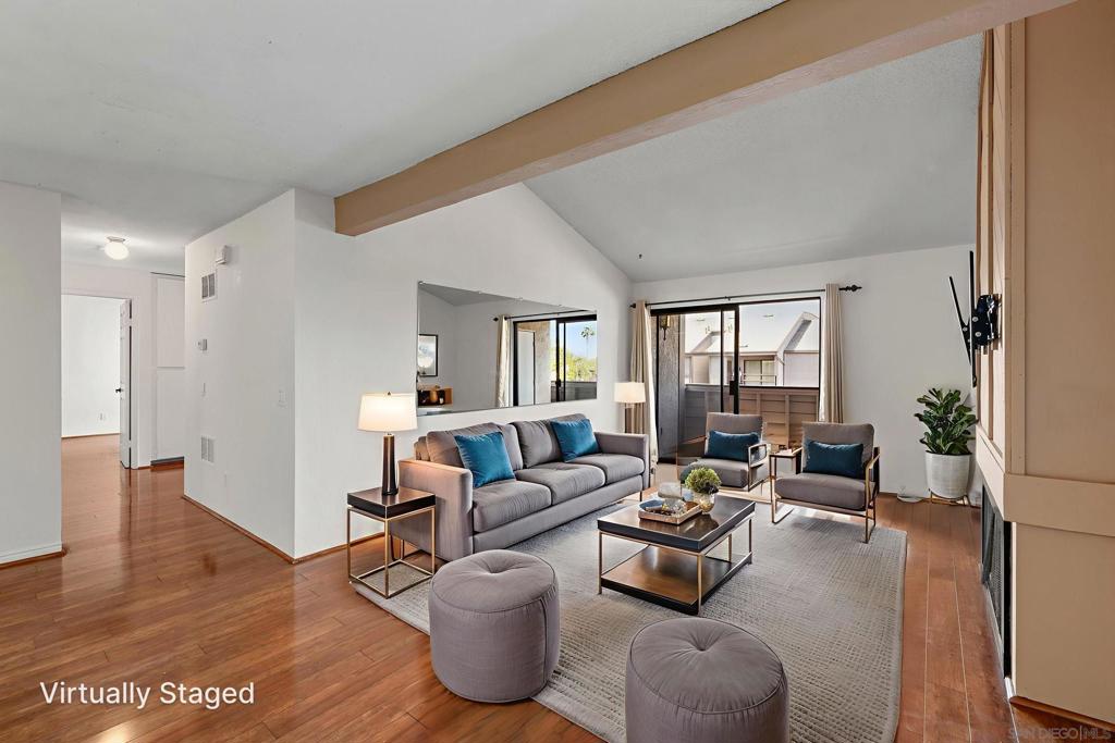 Welcome to this bright and airy top-floor unit offering comfort, convenience, and value. This 3-bedroom, 2-bathroom condo features a spacious open layout with a cozy fireplace, central A/C with combination heat, and a private deck perfect for relaxing or entertaining. Enjoy the ease of in-unit laundry with a stackable washer and dryer, plus the convenience of two assigned parking spaces. The kitchen and bathrooms are clean and functional, with minor upgrades and room to personalize. A small exterior storage closet adds extra utility. Located just minutes from SDSU, major freeways, shopping, and dining, this unit is ideal as a primary residence or rental investment. Low-maintenance living in a desirable central San Diego location—easy to show and ready to go! Parking assigned 318 and 355 Virtually staged photos included.