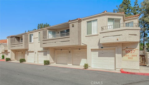 Photo of 1027 Vista Del Cerro Drive #204, Corona, CA 92879 (MLS # OC26174163)
