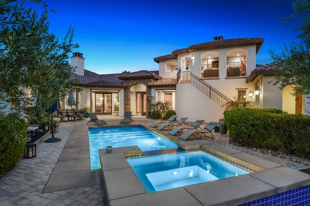Welcome to the Citrus home of your dreams!Pool, spa, and landscaping are all included, along with a private walled courtyard offering stunning mountain views. Enter into the great room and find a formal dining room, a kitchen with granite countertops and full granite backsplash, complete with cherry-finish cabinets and stainless steel appliances.The home features solid Alderwood interior doors, elegant French doors, crown molding, and coffered ceilings throughout. The primary bedroom, guest bedroom, and casita all have private baths with cherry-finish vanities, granite countertops, travertine showers and floors, and walk-in closets.The property comes fully furnished, ready for you to move in and enjoy. The home also includes a three-bay garage--two-car plus a full-size third bay--with an electric car charger for added convenience.