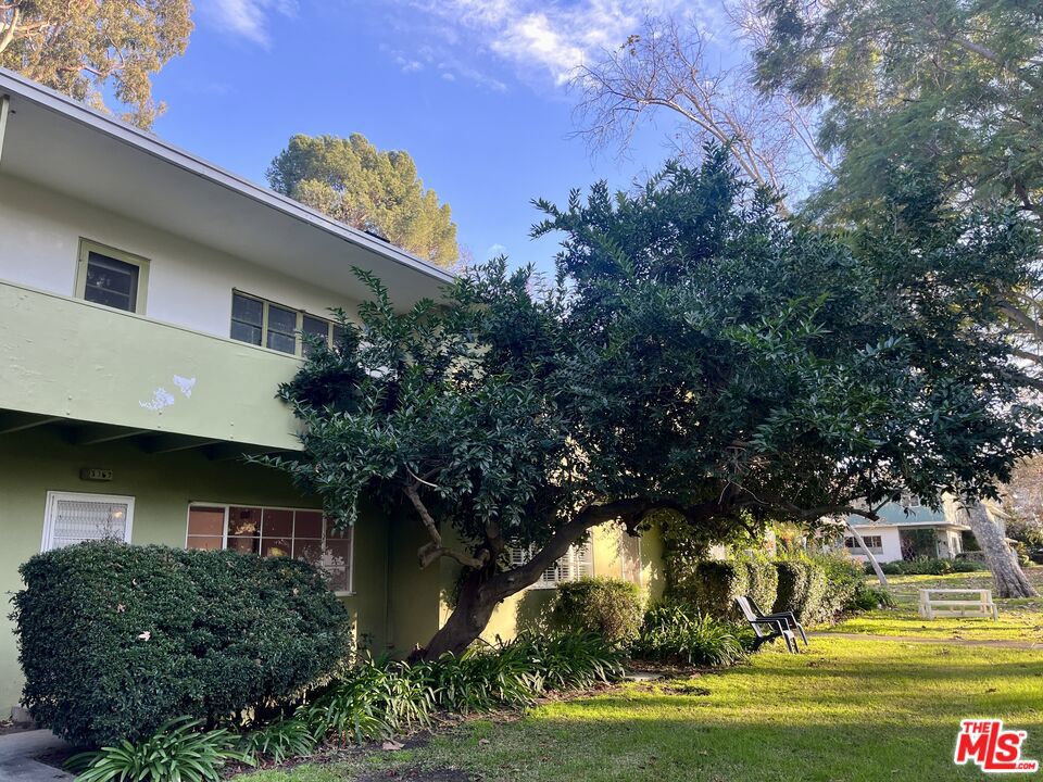 Immaculate split-level townhouse FOR LEASE inside 64 acres of lush grounds & mature trees in Village Green, a National Historical Landmark at Baldwin Vista. This 1,161 SF unit is located in Court 14 and has 2 bedrooms, a fully remodeled kitchen and bathroom, a balcony with gorgeous views to the inner green belt, plenty of closets, a cozy fireplace, a laundry room, and a sunny dining room with direct access to a large private patio. Included in the lease are also a private garage for 1 car, 24/7 patrolled security, and water. Close to LAX, Beverly Hills, DTLA, Baldwin Hills, Crenshaw Plaza, and walking & rolling distance to the Metro Expo Line, Whole Foods, and trendy Downtown Culver City. Call for pets. Available 7/1/25.