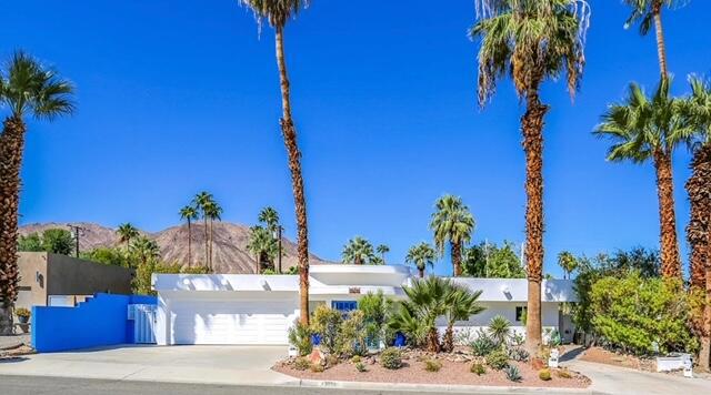 This mid-century home is located in the prestigious South Palm Desert area, just two blocks from the renowned El Paseo Shopping and Dining district. Offering a unique and luxurious experience, the property features a solar-owned system, ensuring energy efficiency and sustainability.The private courtyard is the perfect retreat, with mountain views, a refreshing pebble tech pool, and a waterfall spa. An outdoor bar and sundeck enhance the outdoor space, while the home's design wraps around the pool, creating a seamless indoor-outdoor flow.Inside, the home boasts a luxury master bath with a showcase shower, custom granite countertops, and cabinetry in all bathrooms. The property also features double-paned windows and doors, a foam roof coating, and two energy-efficient AC units with dual zones. The low-maintenance desert landscaping complements the tranquil yard, while the chef's kitchen is equipped with double ovens and top-tier finishes.Additionally, all bedrooms are generously sized, providing ample space for relaxation and privacy. Best of all, there are no monthly HOA dues, offering the freedom of ownership without the added expense. This exceptional property combines comfort, style, and convenience in one of Palm Desert's most sought-after locations.
