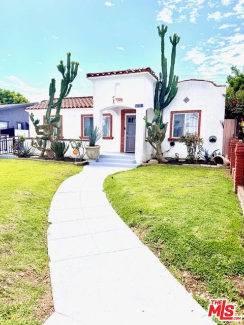 Photo of 2940 Live Oak Street, Huntington Park, CA 90255 (MLS # 26675077)