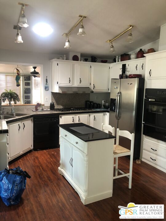 Just Listed a very large remodeled manufactured home in Dillon Estates Mobile Home Club...This park is for active adults, over 55 yrs old. This is a "co-op" ownership park with very low HOA dues ($160./month), it is gated and has remarkable amenities including 2 oversized spas fed and heated with natural hot springs. A very large pool, for swimming laps, a game room, a large BBQ area for residents with ample seating areas. The community room is spacious and used often by residents for functions and parties throughout the year. You will enter the home through the added room (foyer), made part of the main home, walled and insulated, could be an office or den. The living room is very large and includes the dining area with a full wall hutch matching the kitchen cabinets. Large picture windows make the room light and inviting. The kitchen is newer with tile-marble top counters and stainless steel appliances, and an open pass thru window to the added entry room. There is an inside laundry room with more storage and a door to the 2-car tandem garage with an automatic opener. The backspace in the garage has been used for a workshop by the previous homeowner and there is plenty of room for a second car. The guest bedroom is good size and there is a 2nd bathroom across the hall. The primary bedroom is in the back of the home and has a remodeled bath, dual sink vanity and walk-in closet that is open to and adjacent to the bathroom. Some minor repairs and a coat of paint will make this a showplace! Come see this well loved home and make it your own!