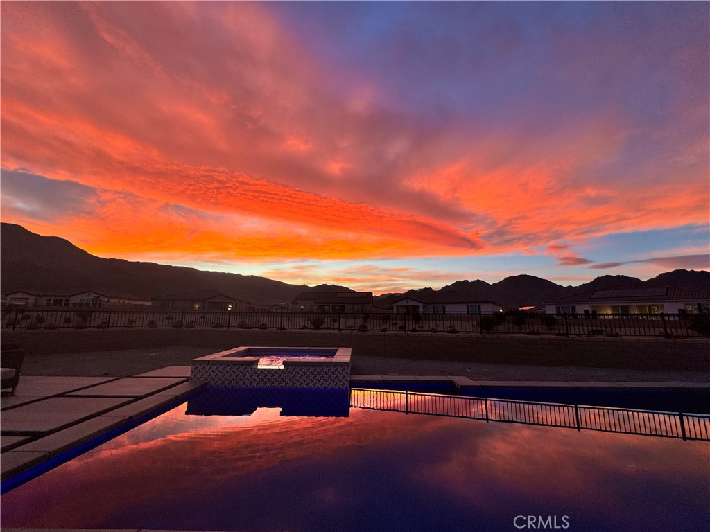 Stay and enjoy some rest and relaxation in this great home! 30 day + minimum. Sleeps 10 comfortably! This home is fully furnished and ready for you to book your stay. Available now. Rental rates vary depending on the time of year. Inquire within. Mountain and Incredible Sunset Views on a pie-shaped lot at the end of a CUL-DE-SAC!! Available NOW! This Brand New Single-Story Energy Star home offers an open-concept chef's kitchen with professional grade Kitchen Aid appliances, a HUGE center island, and a great room with a covered patio outside to enjoy the desert lifestyle. A separate den has French doors to provide a professional and private space for hybrid work and could also serve a dual purpose as a guest room. Lots of space in the 3-car garage with epoxy floors and built-in cabinetry and the almost 14,000+ sq ft lot provides a HUGE newly built pebble tec pool with a raised spa with a water spillway and outdoor built-in fire pit for enjoying the quiet, peaceful desert nights outdoors and stargazing! This home is located in Coral Mountain in Cantera by Beazer Homes. Loaded with upgrades including quartz counters, designer backsplash, laminate wide plank extra long wood flooring, designer tile in bathrooms, custom paint, large baseboards, Smart Tv's in each room, ceiling fans, alarm system, and cameras throughout outside for added security and so much more!!! Won't Last! Rates vary for seasons. Please inquire with listing agent.
Fall SEPT-NOV $6000
Winter DEC-FEB $8000
Spring MAR-MAY $8000
Summer JUN-AUG $5000