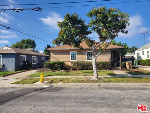 Photo of 10517 Cimarron Street, Los Angeles, CA 90047 (MLS # 26642715)
