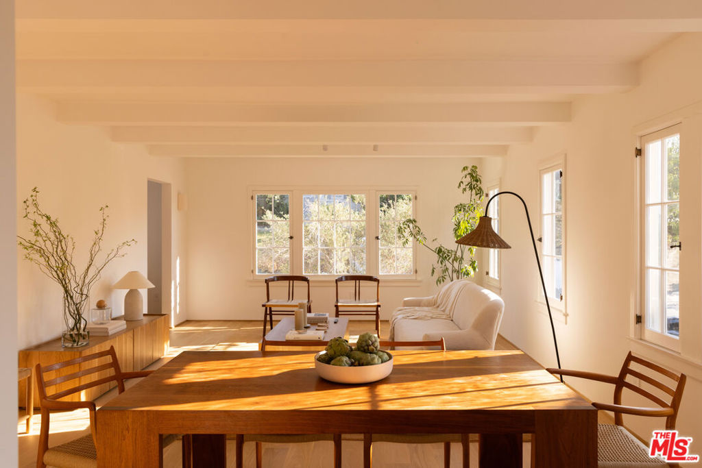 Offered for the first time are four exceptionally renovated 1920s-era residences in a new Tenants-in-Common (TIC) community named Allison. Positioned on the upper level, the space unfolds, revealing glimpses of a bygone era, giving way to modern living with timeless allure. Covetable features include custom-built white oak cabinetry, honed Calacatta Monet Viola countertops, and windows with machine-drawn wavy glass that render a spectacular, painterly light throughout the day. Rear gardens were designed to foster both the community spirit of a TIC and provide each owner with individual outdoor space. The gently terraced gardens are surrounded by mature olive and fruit trees, star jasmine, white gaura, westringia smokey shrubs, lavender, rosemary, some sage, and Cecile Brnner climbing rose, creating a wonderful aromatic cluster of both fragrant and culinary medicinal herbs.. Located just south of Sunset Boulevard, the residences are moments away from our favorite cafes, restaurants, and markets, such as Honey Hi, Dada Market, Canyon Coffee, Little Fish, Bacetti, Donna, as well as Cookbook Market and Lassens Natural Foods.