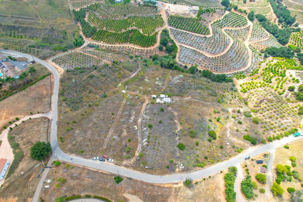 Discover the perfect opportunity to own your slice of rural paradise on McNally Rd in Valley Center, CA! This usable agricultural parcel offers both functionality and potential, featuring water irrigation with a 1-inch meter already installed and set on a timer—ideal for farming or landscaping. A spacious, cold storage packing house structure is included on-site, powered by a generator, making it easy to store tools or produce. Zoned for agricultural use, this land offers flexibility for farming, groves, or nurseries, and also allows for residential development—build your dream home and enjoy peaceful country living. Conveniently located just a short drive to local schools, shopping, and community amenities, this property combines rural charm with accessibility. Don’t miss out on this versatile and well-equipped piece of land—whether you’re looking to cultivate, build, or invest, McNally Rd is full of potential!