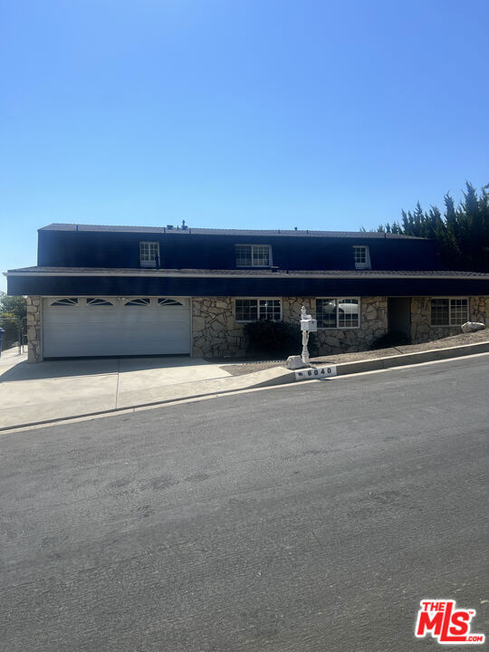 Prime Woodland Hills home offers almost 4k square feet of living space with a pool, view and a wonderful floorpan. Newly replaced roof, new carpets, and freshly painted, this home is live-in ready.