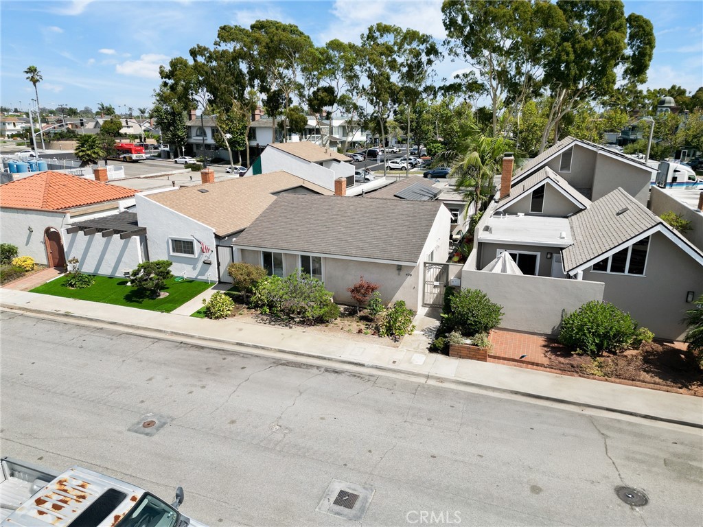Welcome to 408 Galleon Way in Seal Beach, a coastal retreat available for lease. Situated in the desirable Bridgeport neighborhood, this home is just minutes from the beach, marina, and Main Street’s shops and restaurants. The interior features vaulted ceilings and a fireplace in the living room, creating a comfortable, open atmosphere. The kitchen flows to the dining area and opens onto a private patio, perfect for enjoying the ocean air. Two spacious bedrooms and two full baths provide comfort and privacy, while a flexible bonus space is ideal for an office, den, or workout room. Central air conditioning ensures year-round comfort, and the attached two-car garage adds convenience. This home is offered furnished or unfurnished, giving you the flexibility to settle in with ease. Marina Park, just down the street, offers pickleball, tennis, basketball courts, and a playground. Move-in ready, 408 Galleon Way offers the best of Seal Beach living.
