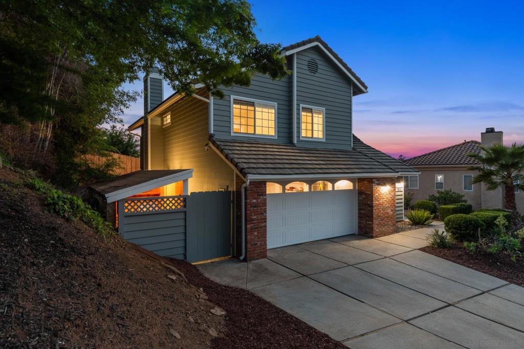 This stunning 4 bedroom, 3-bathroom beauty is tucked up on a peaceful hill just seconds away from Historical Escondido. The home boasts its own private, fully fenced backyard oasis. There is one bedroom and a full bathroom (with step=in shower) downstairs. This house has so many options! Check out the photos for details. We’ve set the dining room and primary bedroom two different ways. (If you only need 3 bedrooms, then see how you could use the giant primary bedroom suite as an upstairs family room.) There is a sweet reading nook hidden in one of the upstairs bedrooms and even a secret walk-in attic space off one of the primary bedroom closets. Custom maple kitchen cabinetry and stainless-steel appliances all convey. The moment you enter your home the Canadian maple reclaimed barn-wood flooring will welcome you through the open floor plan of the living room, kitchen, and dining room. Two gas fireplaces; one in the living room and one in the dining room. Real wood trim, wainscoting, shiplap throughout. New carpeting and fresh paint on the inside, fresh paint on the exterior. Redwood siding, concrete tile roof, finished garage walls, newly fenced and gated backyard with drought tolerant landscaping, and two strategically placed sheds match this beautiful home. AC unit new in 2023. The owners have given meticulous attention to all the details, making this nest move-in ready for you.