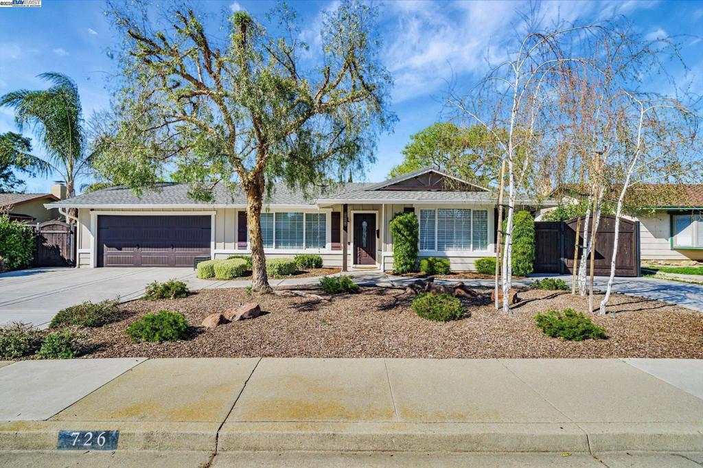 Welcome to this beautifully remodeled single-story home, where luxury and style seamlessly come together to create a truly stunning living space. Every inch of this home has been meticulously renovated. Features include an open-concept living room and chef’s kitchen. High-end appliances, custom cabinets and built-ins, LVP flooring, designer lighting and auto shades throughout. The primary bedroom offers a true retreat, complete with an ensuite bathroom showcasing luxurious finishes. Step outside to your private oasis, designed for ultimate outdoor living. Enjoy alfresco dining at your Pergola outdoor kitchen, which includes a Weber BBQ island, bar, ice machine, and wine refrigerator—perfect for entertaining. Relax by the sparkling pool, unwind to the soothing sounds of the fountain, or challenge friends to a game of bocce. Two custom storage sheds offer ample space for all your outdoor essentials, while beautifully landscaped grounds and custom lighting add the perfect finishing touch. Located in a highly sought-after neighborhood, this home is within walking distance to parks and recreation, and just minutes from shopping and the Livermore Wine Country—offering the perfect blend of style and convenience. Don’t miss the opportunity to own this turn key beauty!