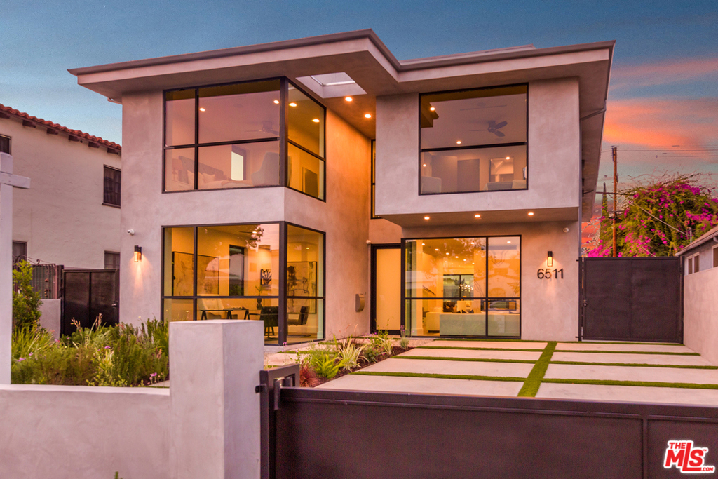 Stunning brand-new construction in central Beverly Grove. Access through your own private automatic gate where you are greeted w/ floor to ceiling Fleetwood windows & doors. Open floor plan w/ 1 en-suite bedroom + powder down w/ remaining 3 bedrooms + large open family room on second level. The master is complete w/ balcony, soaking tub, & generous walk-in closet. 1st floor encompasses gorgeous open-plan kitchen; dining & living open to covered marble floor patio w/ built in BBQ & lush entertainers yard w/ pool, hot tub, waterfall, and vast cabana. Finishes & details include hardwood floors; Italian porcelain bathrooms; Nest air on each floor; surround sound; cameras; DVR; alarm + full Control 4 smart home system. Large rooftop deck w/ majestic sunsets stunning city views. Enjoy your own private staycation w/ the convenience of walking to the heart of W. 3rd Sts soaring dining & shopping! Another impeccable & brilliant production by GME Development, designed by Tom Leishman.