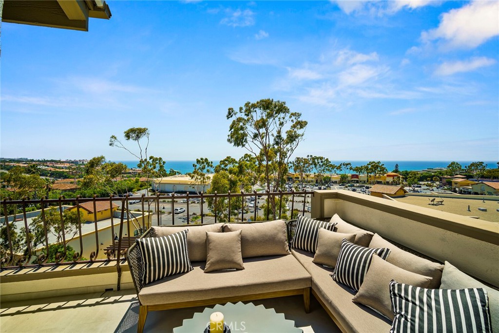 Ocean Views, Designer Finishes & a Remodeled Loft – Coastal Luxury in Dana Point
Welcome to 23276 Atlantis Way #40, a beautifully updated 3-bedroom, 2.5-bath townhome offering panoramic ocean views and a newly remodeled loft. This 1,858 square foot home blends coastal charm with modern upgrades in one of Dana Point’s most desirable neighborhoods, just minutes from the harbor, beaches, and world-class resorts.
The main level features an open-concept layout with soaring ceilings, a cozy fireplace, and seamless indoor-outdoor flow to a private balcony that captures sweeping views of the ocean and Catalina Island. The chef-inspired kitchen has been tastefully upgraded with stone countertops, modern appliances, and generous cabinetry, perfect for entertaining or everyday living.
Upstairs, the primary suite offers vaulted ceilings, dual closets, ocean views, and a spa-like en-suite bathroom. Two additional bedrooms and a full bath provide space and flexibility for guests, family, or a home office. A newly remodeled loft adds even more versatility—ideal for a media room, creative studio, or extra guest accommodations.
The home also includes a private patio, an attached two-car garage with direct access, and access to a resort-style community featuring a pool, spa, and clubhouse. Located close to Salt Creek Beach, Dana Point Harbor, the Ritz-Carlton, Waldorf Astoria, and the shops and dining of the Lantern District, this property offers an exceptional lifestyle of comfort, convenience, and coastal elegance.
Don’t miss the chance to experience this ocean-view gem—schedule your private showing today.