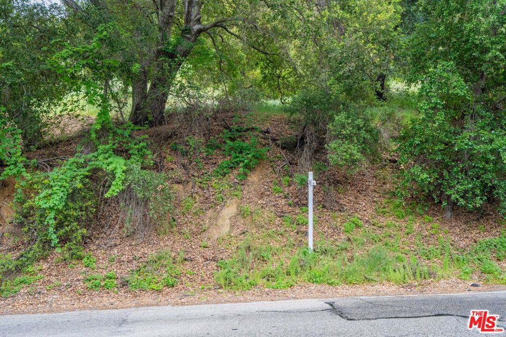 Listed for sale with 2 other nearby parcels this upslope lot is ready for your architects vision. Build your dream home in a charming area of Calabasas. Buyer should verify all information to their own satisfaction and with the appropriate professionals.