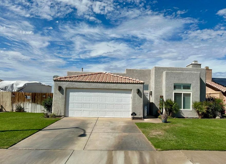 Beautifully Upgraded 3-Bedroom Home with Modern ComfortsWelcome to this stunning 3-bedroom, 2-bath home offering over 1,900 sq. ft. of upgraded living space. Thoughtfully designed with both style and functionality in mind, this property is move-in ready and packed with features.Enjoy a remodeled living room with a modern fireplace, plantation shutters throughout, recessed lighting, and ceiling fans in every room. The kitchen is equipped with a new refrigerator, microwave, dishwasher, and washer/dryer, while a Kinetico whole-house water softener and reverse osmosis drinking system add everyday convenience. The master suite features an upgraded carpet, a fully upgraded walk-in shower, and plenty of space to relax.Step outside to a covered back patio with an extended concrete surface, large fan, and added electrical outlets--perfect for entertaining. The landscaped yard includes a sprinkler system, a large enclosed storage shed, and a gravel side yard ideal for storing toys, razors, or trailers.Additional highlights include a two-year-old energy-efficient AC unit, smart thermostat, advanced home security system with cameras at both gates and the doorbell, plus a large-blade patio fan for comfort year-round. Purchased Solar at $189 monthly. This home truly has it all--modern upgrades, energy efficiency, and plenty of space inside and out. Don't miss the chance to make it yours!More photos to come soon.