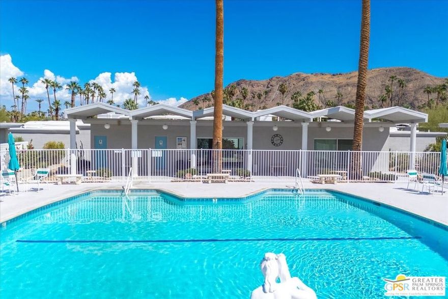 Discover this inviting mid-century modern condominium in the historic Villa Roma community, located in the highly desirable South Palm Springs area known for its lack of overhead power lines and being outside the wind zone. This rare end-unit "Cleopatra" model offers two bedrooms plus a den, two full bathrooms, and a well-designed floor plan that blends comfort with functionality. The open living and dining area features a fireplace and opens to a private covered terrace, perfect for morning coffee or evening relaxation. The kitchen includes a breakfast bar and views of the San Jacinto Mountains. Freshly painted interiors, updated lighting, waterproof Pergo flooring, and restored terrazzo in the entry and baths balance modern convenience with mid-century charm. The den with a wet bar adds flexibility for an office, media room, or optional third bedroom. Additional highlights include an in-unit washer and dryer, assigned covered parking conveniently close to the unit, ample guest parking, and a newer high-efficiency HVAC system. Rent includes HOA fees covering water, sewer, trash, cable, internet, and exterior maintenance. Villa Roma residents enjoy a saltwater pool, spa, and clubhouse framed by striking Roman Revival architecture. The neighborhood is consistently featured during Modernism Week and has even appeared in the film Don't Worry Darling. Just minutes from downtown dining, shopping, galleries, cafes, bars, and entertainment. For those seeking a healthy lifestyle, options abound, including jogging, hiking, golf, tennis, and pickleball, making this location an effortless way to enjoy Palm Springs..Available for a 2-year lease.