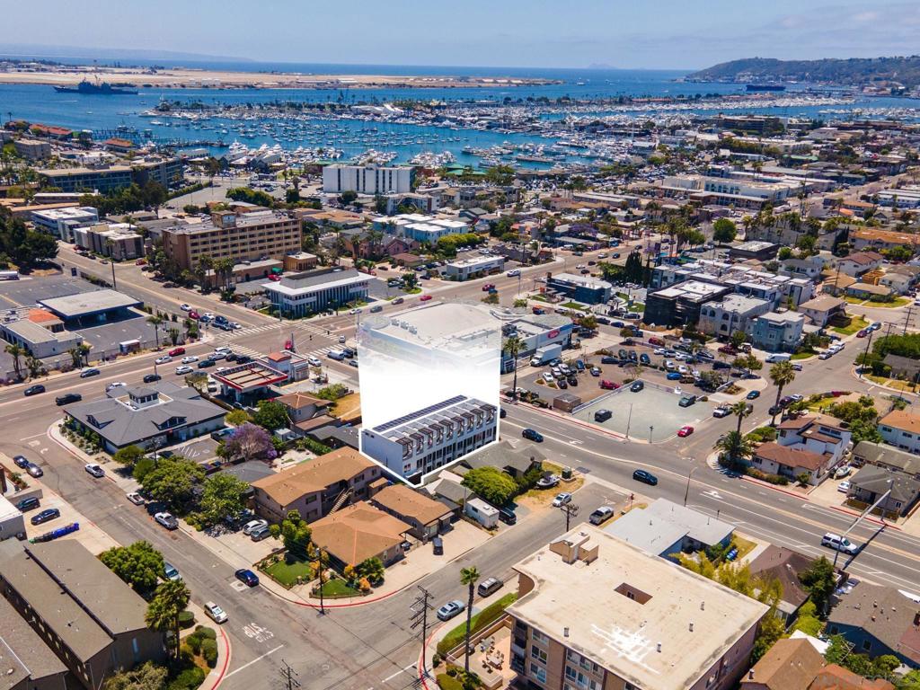 We are pleased to present Liberty Row Apartments, a newly constructed 9-unit trophy asset in the Point Loma neighborhood, San Diego’s quintessential coastal destination. Built in 2024, with a perfect blend of luxurious design and seaside location, Liberty Row Apartments is a high-quality home base for residents to thrive. The unit mix is comprised of nine three-story townhomes with (8) one-bedroom / one bath floorplans averaging 568 square-feet and (1) one-bedroom / two-bath floorplan with 799 square-feet. Each unit features oversized windows with plenty of sunlight, single car garages, designer kitchens with quartz countertops, stainless-steel energy star appliance packages, contemporary interior finishes, in-unit washers and dryers, and extensive insulation for comfortable and quiet living. Every unit offers a fourth story private rooftop deck with views of the glistening San Diego Bay, harbor, yacht clubs, the skyline of America’s finest city, and Coronado. The property has the potential to add studio floor plans by converting the garages into ADUs. Liberty Row Apartments is in the heart of bayside Point Loma, two blocks away from Americas Cup Harbor, less than one half-mile from Liberty Station, one block from Rosecrans Street, the major thoroughfare for the area, and a convenient 15-minute drive to downtown San Diego, a Tier-One employment center and the largest in the region. Residents enjoy quick access to all that the bay has to offer including access to private boat charters and yachting, world-class sportfishing.