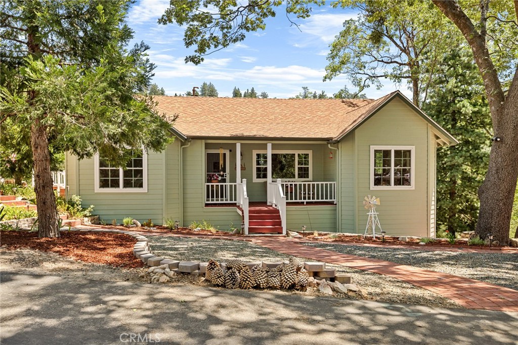 Nestled on a quiet cul-de-sac in Smiley Park Country Club you will feel peace and tranquility on this 1.25 acre lot! This beautiful home has so much to offer. including newer carpet 2021, wood floors, newer windows 2021, newer roof 2021, exterior painted 2021, hardy board siding and more! On the main floor the house features a living room w/fireplace insert, a large great room w/vaulted ceiling, an office/den, two bedrooms, full bath, kitchen & dining area, large walk-in pantry with laundry hookups. The downstairs features 2 bedrooms, full bathroom with a large walk-in shower, full size spa, laundry room with access to a workshop and small porch. A large hardy board deck (requiring no maintenance) is accessible from the main floor is perfect for large family gatherings or just relaxing and listening to the surrounding wildlife! Enjoy the Smiley Park club house with pool, bbq, and picnic area perfect for any family gatherings. With just minutes to the local ski resort and hiking trails are just a few of the many community features. Make this custom built home your next forever home!