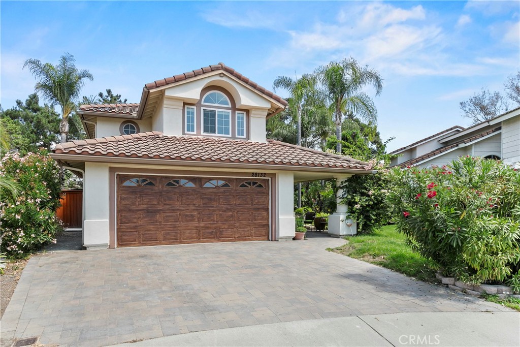 Nestled at the end of a private cul-de-sac on a desirable single-loaded street, this Laguna Niguel residence offers a rare combination of space, privacy, and community lifestyle. Designed with comfort in mind, the home welcomes you with soaring ceilings, abundant natural light, and wide-plank oak flooring that carries throughout the interior. A graceful wrought-iron staircase sets the tone for a layout that balances elegance with everyday livability. The main level includes a formal living and dining area, a comfortable family room with a custom fireplace and a versatile bedroom currently used as a den or office. The kitchen has been fully remodeled with new appliances including the stove, microwave, refrigerator and dishwasher. It features stone countertops, a stylish backsplash, new sink and walk-in pantry. It is both functional and modern, opening to the living spaces and offering a warm gathering place for family and friends. Upstairs, the primary suite provides a peaceful retreat with dual vanities, a soaking tub, walk-in shower, and mirrored wardrobes. All bathrooms throughout the home have been tastefully remodeled with sleek finishes. A convenient upstairs laundry room completes the thoughtful floor plan. Outdoors, the expansive lot offers room to relax, entertain, and enjoy the Southern California lifestyle. Additional upgrades include new pavers on the driveway, front yard and backyard, a new gazebo ideal for outdoor entertaining and new fencing for added privacy. The surrounding neighborhood enhances the appeal with membership at The Club at Rancho Niguel, where resort-style amenities include pools, spa, fitness center, tennis and pickleball courts, basketball and racquetball courts, a clubhouse, playground, and more. Perfectly situated near parks, trails, award-winning schools, shopping, and dining, this home offers the opportunity to enjoy both the charm of an established neighborhood and the benefits of modern updates in one of Laguna Niguel’s most sought-after communities.