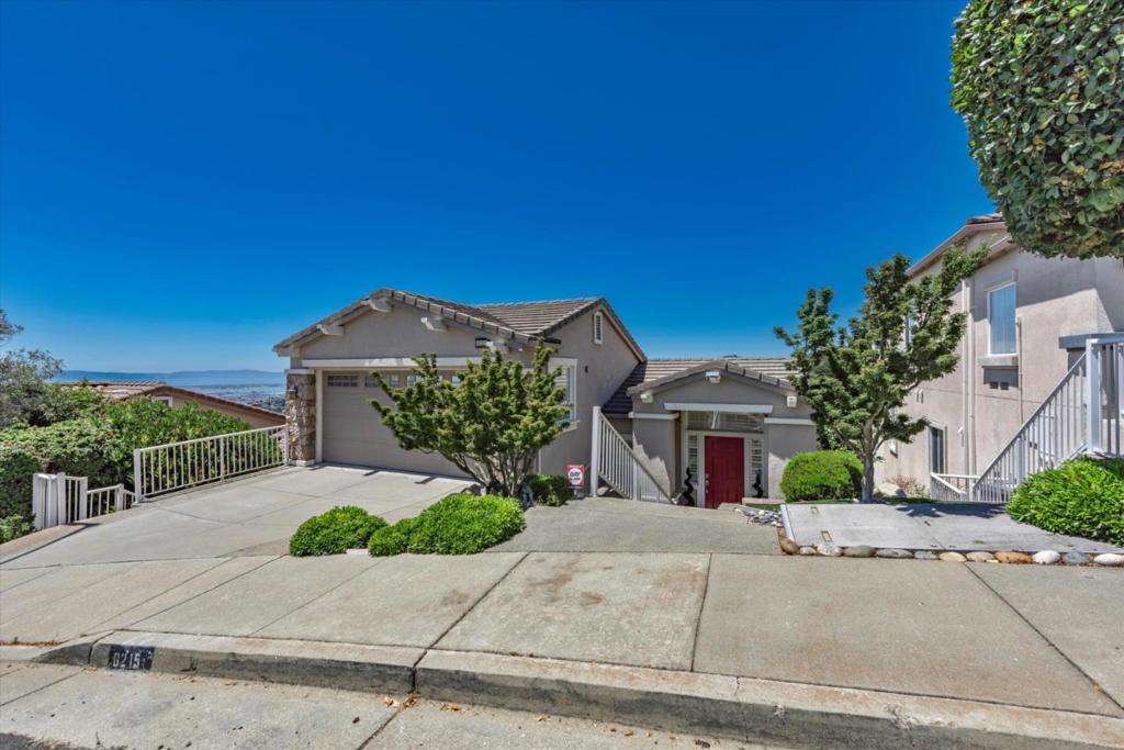 Stunning executive-style home nestled in the prestigious Oakland Hills, featuring a plethora of upgrades and offering breathtaking views. This property, which abuts conservation land, boasts unparalleled city, water, and greenland views from nearly every room. The home features top-of-the-line window coverings, including wood plantation shutters throughout. The true cook's kitchen is a culinary dream, equipped with GE Profile appliances, an abundance of cabinets, and a fully remodeled design that seamlessly blends style and functionality. Crown molding adorns the living and dining rooms, adding an elegant touch to the open and inviting spaces. The master bath is a marble oasis, exuding sophistication and luxury. The bathrooms have been thoughtfully remodeled and updated, ensuring modern comfort and convenience. Additionally, the garage stands out with epoxy floors and freshly painted walls, offering a pristine and functional space. This home is positively spectacular, combining executive elegance with the tranquility of its natural surroundings.