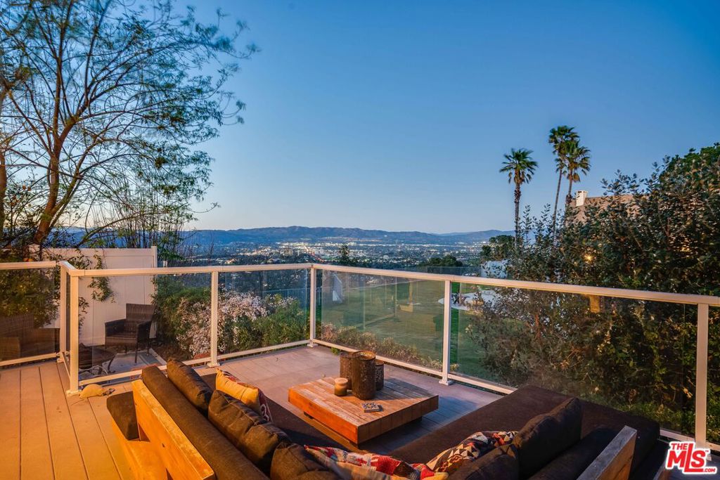 LENDER OFFERS 1% INTEREST RATE REDUCTION - Breathtaking airline views, and access to both the ocean and the valley, all for under $1M. Newer home - built in 2015, this rare view home offers a warm, modern aesthetic and an open layout designed for light-filled living. Floor-to-ceiling windows frame stunning vistas of mountains and sparkling city lights, while doors lead to an expansive deck perfect for outdoor gatherings. The kitchen features sleek stainless appliances, a convenient central island, and abundant storage, making it a cook's delight. A soft neutral interior palette, stylish lighting, central air and heat, laundry/coat room enhance the home's comfort and functionality. Property purchase includes the land - making this a unique opportunity. Located in a private gated dog-friendly neighborhood with incredible amenities including a heated pool, spa, gym, clubhouse, and on-site management, you'll enjoy an effortless lifestyle. Set on a quiet street, this home is close to favorite hiking trails, cute cafes & restaurants, shopping and schools. Community has recently spent $12M + dollars in upgrades. Where else can you find this kind of value and versatility?