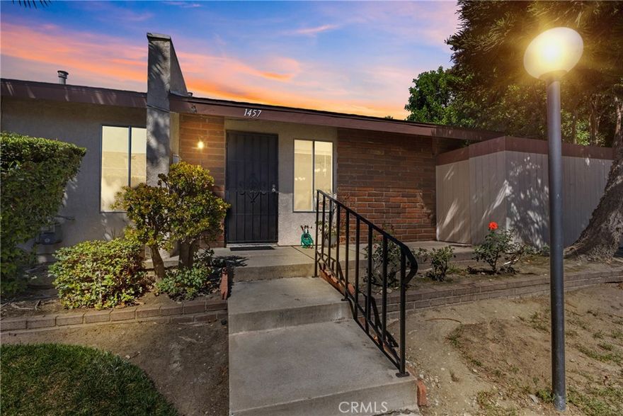 Welcome to a single floor plan 3 Bedroom / 2 Bathroom condominium located in the  desirable commuter-friendly City of Upland. This light and bright single family home features a very spacious  floorplan with new vinyl flooring, tile in kitchen, dining room and bathrooms. This condo offers plenty of daylight and is spacious with cathedral/vaulted  ceilings in living room. Entry door faces south. Kitchen is updated and a large private covered patio with private side entry.  Property has in kitchen washer and dryer hook-ups in home.  Property has plenty of lush landscaping with meandering paths, and walking distance to the  association pool and jacuzzi.  Additionally. there is a one car detached covered garage with remote control access and an additional open space parking space. Book your private showing today! There is plenty of retail surrounding this condominium complex and commuter friendly near I-10 freeway and Ontario International Airport.