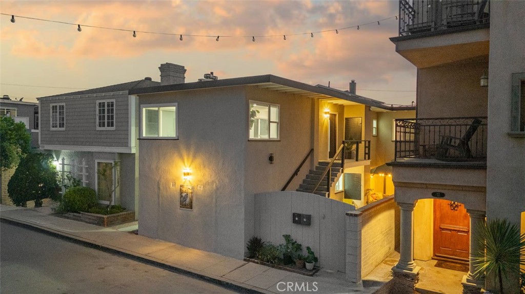 Welcome to 23 65th Place, a beautifully reimagined duplex nestled between the Pacific Ocean and Alamitos Bay on the highly coveted Long Beach Peninsula. Thoughtfully renovated from top to bottom, this coastal gem now features two fully separated, turnkey units perfect for multigenerational living, rental income, or a flexible beach lifestyle.
The ground level unit offers a spacious one bedroom, one bathroom layout with an open concept living and dining space, designer kitchen with new cabinetry and quartz countertops, and a custom-tiled bathroom with upscale finishes. Upstairs, the second unit features two bedrooms and one bathroom, showcasing an open and airy floor plan, brand-new kitchen, and large windows that capture the ocean breeze and surrounding views.
Every inch of the property has been updated with modern coastal style, including new kitchens, bathrooms, flooring, paint, lighting, and fixtures throughout. The spiral staircase has been removed, allowing each unit to enjoy complete privacy with its own entrance.
Additional highlights include an oversized two-car garage, extra storage, on-site laundry, and space for up to 3 additional cars, an absolute luxury at the beach.