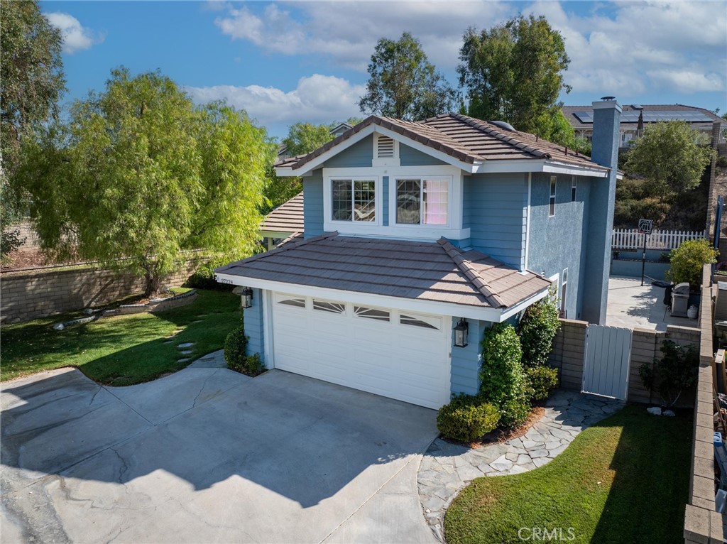 Welcome to 27224 Waterford Drive — Northbridge Charm with One of the Largest Yards in the Neighborhood! Tucked away on a private flag lot in the highly desirable Northbridge community, this well-maintained 3-bedroom, 2.5-bathroom home offers 1,548 sqft of comfortable living space on a rare 14,166 double-wide lot — one of the largest in all of Northbridge. From the moment you arrive, you’ll notice the peaceful privacy and exceptional curb appeal this home offers. Step inside to find a warm and inviting interior that has been modestly updated, including refreshed kitchen cabinetry and modernized countertops, blending timeless charm with practical upgrades. The real showstopper? The expansive backyard!!! Whether you're dreaming of a pool, an outdoor kitchen, or simply more room to relax and entertain, this one-of-a-kind oversized lot offers limitless potential to create your own personal oasis — a rare find in this area. Don’t miss this opportunity to own a unique property with both indoor comfort and outdoor space to spare — all in a sought-after Valencia location close to top-rated schools, parks, shopping, and community amenities. Schedule your showing today!
