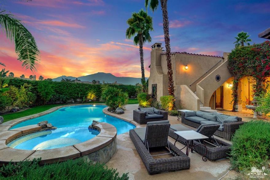 Highly upgraded Mediterranean home in Rancho Santana with designer appointed upgrades with new Versailles pattern travertine floors, paint, shutters, & solar shades, new living room slider doors, fireplaces in family room & master bedroom, LED lighting throughout, custom cabinetry in master bedroom & garage, a culinary kitchen offers stainless steel appliances, including a brand new sub zero refrigerator, granite counter tops, under cabinet lightning, & wine cooler. Sonos ready surround system, over size laundry room, and a separate casita with full bath,and a separate office. The completely private oversized corner lot has a stunning backyard and mountain views with saltwater pebble tec pool & spa, built-in kitchen with refrigerator, sink, & BBQ, custom fire stone water feature, built-in granite entertainment area with pergola, lush landscaping, LED lightning, 2 built-in fountains, roof top deck, & exterior shed. Garage has epoxy floors. Shows like a model home! Low HOA Dues!