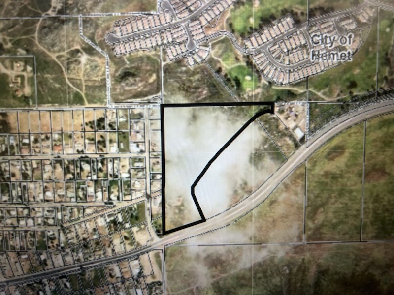 11.47 acre APN#465-040-031 city sewer, city water, electric and gas in calvert , lot touches a commercial lot at corner of 74 and calvert .