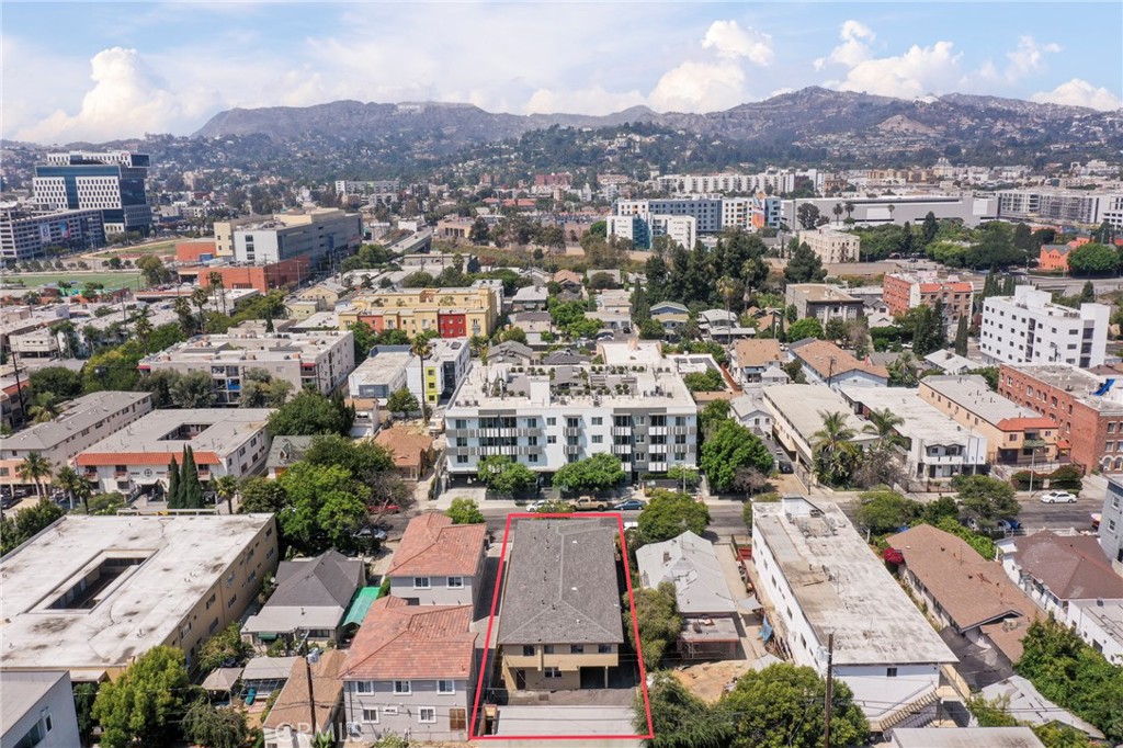 Prime Hollywood 8-Unit Apartment Building with (7) 1 Bedroom and 1 Bathroom Units and (1) 2 Bedroom and 1 bathroom Unit with 5 carport parking spaces and 2 uncovered spaces. Excellent Investment Opportunity! Welcome to 5642 Lexington Avenue, a rare opportunity to own an 8-unit multi-family property in the heart of Hollywood. This well-maintained building offers a diverse mix of units with strong rental income potential in one of Los Angeles’ most dynamic and sought-after rental markets. All balconies have been retrofitted per code and the building has a newer composition shingle roof. Situated on a 7,099 sq. ft. lot, the property features ample on-site parking for residents, community laundry facilities, and a secure, low-maintenance setting. Each unit has long term tenants who are all on month to month lease agreements and each unit is individually metered for gas and electricity, maximizing investor flexibility and reducing operating costs. Located just minutes from Sunset Boulevard, Paramount Studios, the Hollywood Media District, and countless restaurants, shopping, and entertainment options, this property boasts a walkable location with easy freeway access. Whether you’re looking to expand your portfolio or secure a stable, income-producing asset in an A+ rental location, 5642 Lexington Ave is a must-see.