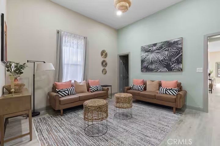 Charming Remodeled Home in Downtown Riverside. Located in the highly sought-after Heritage Square neighborhood, this beautifully remodeled 2-bedroom, 1-bath home blends historic charm with modern comfort—just a short walk to the iconic Mission Inn and vibrant Downtown Riverside. Inside, you’ll enjoy:• Two comfortable bedrooms with plenty of natural light and add-on space perfect for a home office. • One full-size bathroom updated with modern finishes• Two spacious family rooms—perfect for relaxing, gathering with friends and family• A large dining area ideal for hosting family dinners or entertaining guests• A fully equipped kitchen with stainless steel appliances• A laundry room with washer and dryer included for your convenience. The property also offers a long driveway that fits 2–3 standard-size cars, plus additional street parking. Optional perks:
• Available furnished or unfurnished to fit your lifestyle• Flexible lease terms, with minimum 30-day stays available (subject to terms and conditions)
With its prime location in one of Riverside’s most charming historic districts, you can stroll to local shops, restaurants, museums, and cultural events—making this home the perfect blend of space, comfort, and convenience. Call to schedule your tour today!