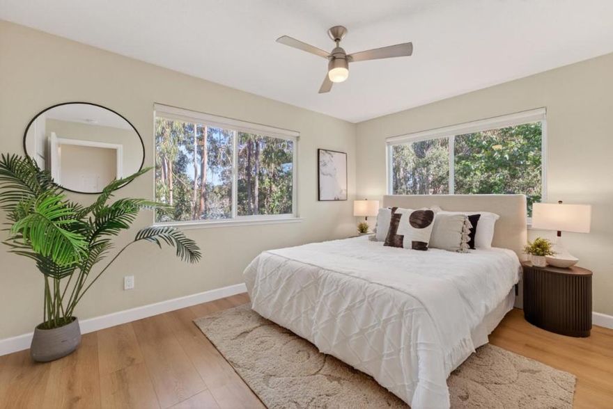 Move right in and start living the ultimate Santa Cruz beach life! This beautifully updated, top-floor, end-unit condo is perfectly situated just a few blocks from the sand, the Harbor, and some of the areas best restaurants, coffee shops, beaches and breweries. Step inside to find a bright, open living area that flows effortlessly into a modern kitchen featuring quartz countertops, stainless steel appliances, shaker cabinets, and a stylish tile backsplash. Enjoy morning coffee or evening breezes on your sunny private deck surrounded by mature trees and landscaped grounds. The primary bedroom overlooks Schwan Lagoon, has multiple windows and includes a large walk-in closet. The community offers resort-style amenities including a pool, gym, clubhouse, multiple BBQ areas and open green spaces. Whether you're looking for a primary home or a weekend coastal retreat, this one has it all; style, comfort, and that signature Santa Cruz vibe. Welcome home!