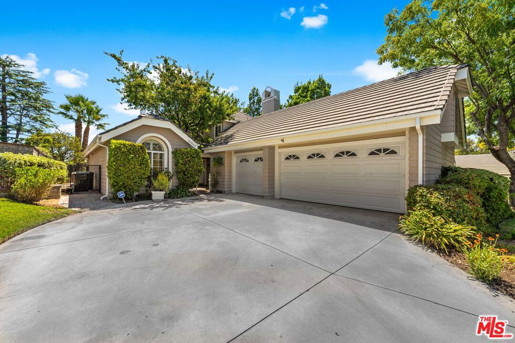 Just Listed in The Summit. Beautiful 4 Bedroom Home! Welcome to this stunning 4-bedroom, 3.5-bathroom home located in the highly desirable Summit community of Valencia. Perfectly situated near shopping centers, grocery stores, restaurants, hospitals, and the I-5 freeway, this home offers both convenience and comfort. You'll also enjoy being just minutes away from Magic Mountain and all that Valencia has to offer. Community Amenities: Three community pools, including an Olympic-size pool and a kiddie pool. Clubhouse that can be rented for private events On-site barbecues for residents to enjoy. Tennis courts and beautifully maintained common areas. One of the pools is located just a block away from the home. Home Features: Spacious master suite with a fully renovated bathroom, custom shower, and walk-in closet. Second en suite with its own private bathroom. Two additional bedrooms downstairs with a full bath plus a guest half bath. Renovated kitchen with quartz countertops and stainless-steel appliances. (all included, approx. 4 years old). Hardwood floors, tile, and carpet throughout. Freshly painted interior. Additional Highlights: Three-zone A/C system (only 5 years old). Garage with attic access and extra storage. Brinks alarm system, smoke and carbon monoxide detectors. Two TVs with surround sound wired throughout the home, with controls in each room. Fully landscaped front and backyard with patio misters. Custom-built barbecue pit with extra gas lines for a Blackstone grill. Beautiful views to enjoy year-round. This home combines modern upgrades, comfort, and resort-style living in one of Valencia's most desirable neighborhoods.