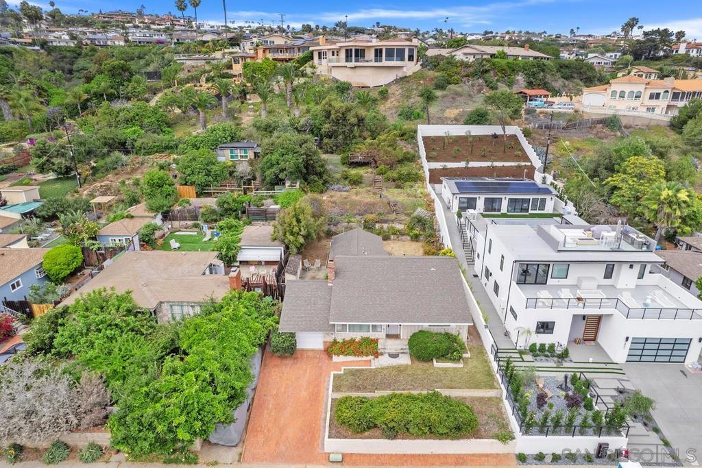 Nestled in the highly desirable Bird Rock neighborhood, this home is surrounded by charming tree-lined streets, boutique shops, top-rated schools, and is just blocks from the Pacific Ocean! Ideally perched above the road, this oversized view lot with giant elevated backyard presents a plethora of opportunity. This legacy property presents a prime pathway to ownership in one of San Diego’s most coveted coastal communities. This single story home offers a perfect canvas for those with vision and a desire to create something truly special. With thoughtful updates and curated renovation plan, this home is ready for transformation into a stunning coastal retreat, primary residence, or high-value resale. Enjoy walking distance to Bird Rock Coffee Roasters, Beaumont's Eatery, and a variety of neighborhood favorites, or take a short drive to the La Jolla Village, Windansea Beach, and world-renowned La Jolla Cove. Easy access to freeways, parks, and top medical centers adds even more value.