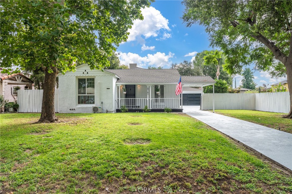 Welcome to this Beautiful and cozy, private ranch style home in a quiet community. This great 3 bedroom and 1.5 bath home is newly remodeled , new roof, new energy efficient windows, mini splits AC/heater also with a swam cooler, this house counts with spacious bedrooms with good sized closets. The renovated kitchen has a great open design with new cabinets with plenty spaces and nice quartz counters. Adjacent, just a few steps away, you can take some time with the family in your cozy living room with it's fireplace perfect for the holidays. Enjoy a nice afternoon day swinging on your new front porch just to relax. If you prefer, entertain family and friends in your beautiful private backyard landscaped with plenty of lush green open space for your next gathering. There's plenty of covered parking under a convenient car port and a detached garage with potential use as an ADU. This home has a grow room that has limitless possibilities. Conveniently located home close to all of your everyday needs with easy access to the freeway, School, churches, and restaurants and stores. Price to sell!