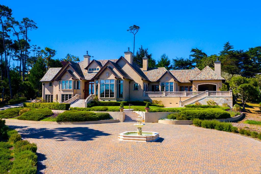 Exquisite Eric Miller designed Neo-classical Mediterranean Estate perched on 2.11 gated and fenced acres overlooking the fairways of the Cypress Point golf course, Fan Shell Beach and the ever changing Seascapes of the Pacific Ocean. The architectural design and finishes, custom limestone cast fireplaces, Brazilian cherry flooring, Chefs kitchen, pantry and stunning cabinetry in the Butlers Pantry by Clive Christian overlooking the spacious limestone patios and balcony are an entertainers delight. The Grand formal entry with spacious living and dining rooms, separate office/library games/family room, adorn the easy flow and comfortable living style of this 4 bedroom, 5 bath 6200+ SF residence. Enjoy ample parking for all your guests with a gated entrance, paver stone driveway, manicured gardens, game court and fabulous outdoor kitchen/lanai to complete the Old World Charm of this masterpiece!