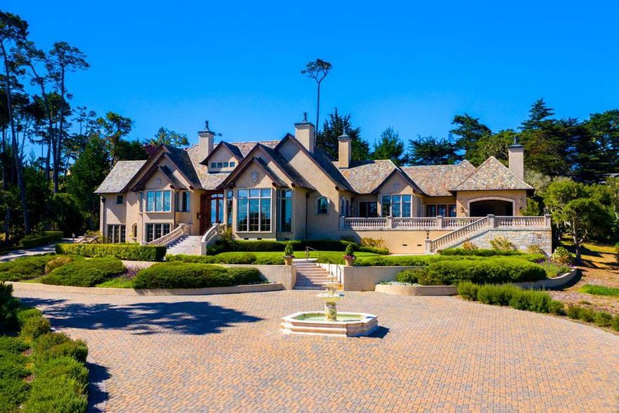 Exquisite Eric Miller designed Neo-classical Mediterranean Estate perched on 2.11  gated and fenced acres overlooking the fairways of the Cypress Point golf course, Fan Shell Beach and the ever changing Seascapes of the Pacific Ocean.  The architectural design and finishes, custom limestone cast fireplaces, Brazilian cherry flooring, Chefs kitchen, pantry and stunning cabinetry in the Butlers Pantry by Clive Christian overlooking the spacious limestone patios and balcony are an entertainers delight. The Grand formal entry with spacious living and dining rooms, separate office/library games/family room, adorn the easy flow and comfortable living style of this 4 bedroom, 5 bath 6200+ SF residence. Enjoy ample parking for all your guests with a gated entrance, paver stone driveway, manicured gardens, game court and fabulous outdoor kitchen/lanai to complete the Old World Charm of this masterpiece!