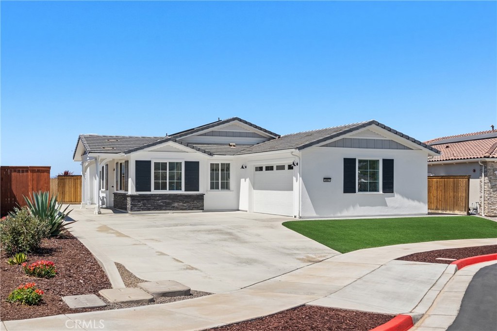 Welcome to 5807 Foxglove Court in the highly desirable Rice Ranch community of Orcutt! This beautiful single-story home, built in 2020, offers model-like quality and modern comforts throughout. Featuring 3 bedrooms, 2.5 bathrooms, 1,843± sq. ft. of living space, plus a versatile bonus room/optional 4th bedroom or office, this home is designed with both functionality and style in mind. Step inside to find an inviting open floor plan with light-filled living spaces, a cozy gas fireplace, and a dedicated den area (or flexible office/bonus space—make it your own!). The gourmet kitchen is a showstopper, complete with light quartz countertops, modern cabinetry, custom tile backsplash, premium stainless-steel appliances, oversized center island with a farm sink, bar seating, pendant lighting, and a convenient dishwasher. The refrigerator is also included. The luxurious primary suite features direct sliding door access to the private backyard patio, along with a spa-like bathroom boasting quartz countertops, dual sinks, freestanding tub, custom-tiled shower, private toilet room, and a spacious walk-in closet. Enjoy year-round comfort and efficiency with an owned solar system, tankless water heater, and a 2-car finished garage. A separate laundry room with a utility sink adds extra convenience. You will definitely be amazed by all of the stunning upgrades throughout the entire home! Outdoor living is a delight in the private, low-maintenance backyard, perfect for entertaining or relaxing. This cul-de-sac home sits on a generous 6,534 sq. ft. lot and offers ample driveway parking. As a resident, you'll enjoy exclusive access to the Rice Ranch Summit Club, featuring a swimming pool, hot tub, fitness center, bocce ball, pickleball, BBQ areas, and more. All of this in an ideal Orcutt location close to shopping, dining, award-winning schools, parks, and just minutes from all the beauty of the Central Coast. 5807 Foxglove Court is truly turnkey move in and start enjoying the Rice Ranch lifestyle today!