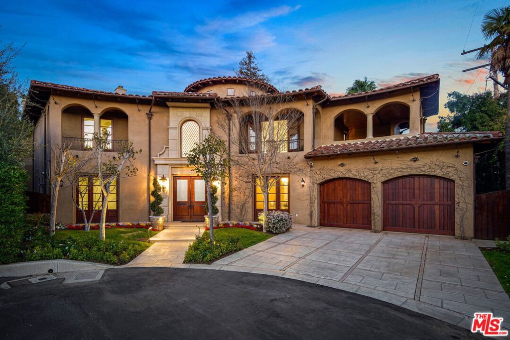 A rare private gem. This newer construction Brentwood trophy estate was recently updated with fresh paint, resurfaced hardwood floors, Lutron lighting system, new pool equipment and much more- turnkey ready to move into. Home includes dramatic soaring two-story foyer, wood pitched beam ceilings throughout, expansive living, dining, and family rooms. Gourmet kitchen with center island and seating area. Exquisite primary bedroom with large resting area, dual closets and steam bath. All bedrooms are en-suite and entire top floor includes private terraces. Custom saltwater pool and spa (with waterfalls), lawn and lounge area that leads to a vast private deck overlooking an expansive fully planted multi-level organic garden (with composting area), equipped with wireless watering system. Home includes speaker and security system throughout. A rare sanctuary built in Brentwood's most sought-after area offers unparalleled amenities, privacy and comfort.