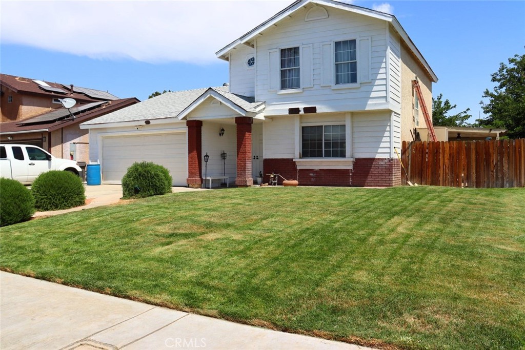 Experience the perfect combination of comfort and convenance in this beautifully designed two-story home, offering three spacious bedroom with the flexibility to convert a downstairs area into a fourth bedroom ideal for guest, a home office, of play area. Covered patio with cement slab with lighting. Recently redone roof that is five months old. Located in a highly desirable neighborhood, it provides unmatched accessibility with multiple shopping center, schools for all grade levels and a beautiful park all within a five minute drive. Families can also enjoy access to the local water park. Commuters will appreciate the easy connectivity to Highway 138 and the fourteen freeway. Schedule your viewing today to tour your future home